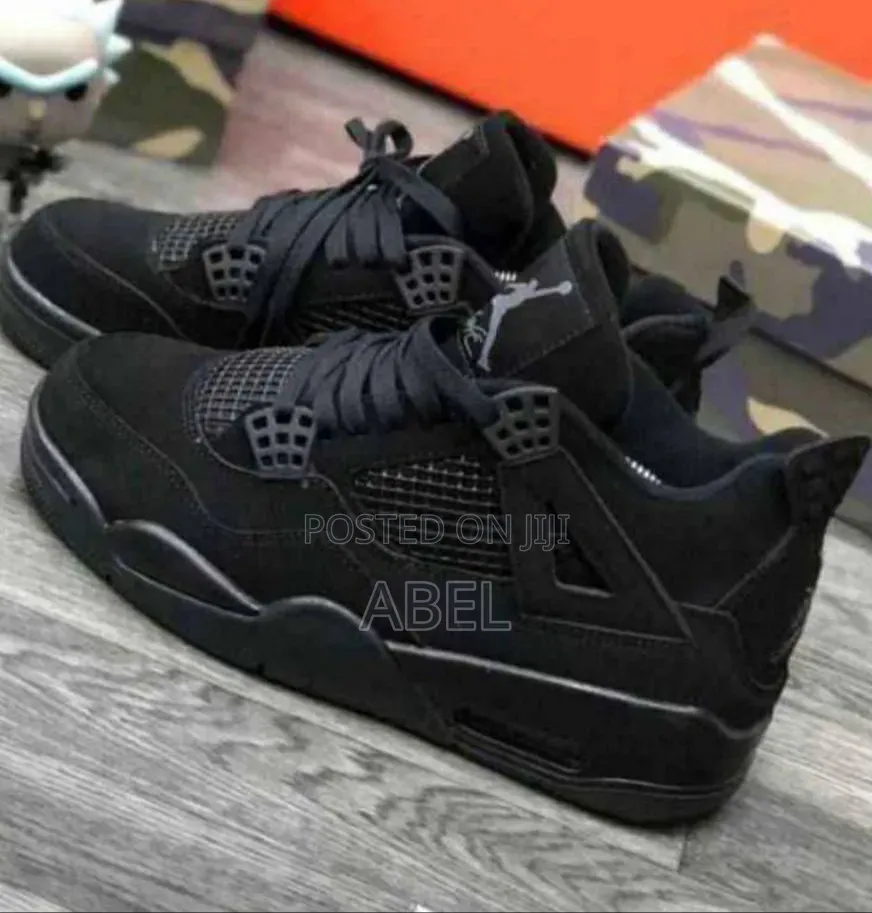 Air Jordan 4 Retro "Black Cat,"