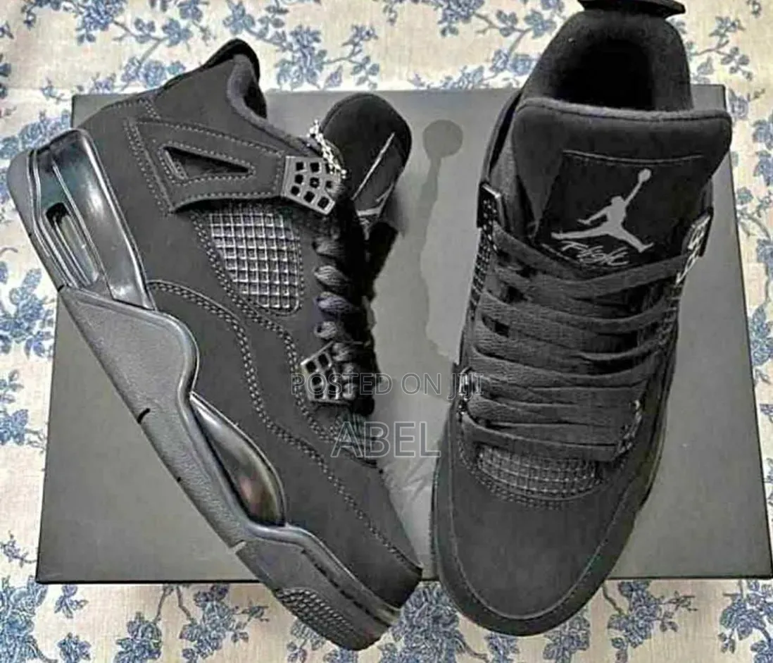 Air Jordan 4 Retro "Black Cat,"