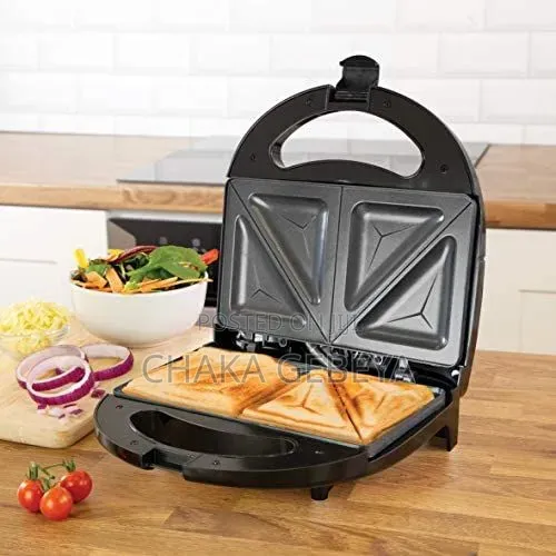 - Non-Stick Plates, Fast Heating, Easy Clean