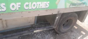 Isuzu NPR With Container