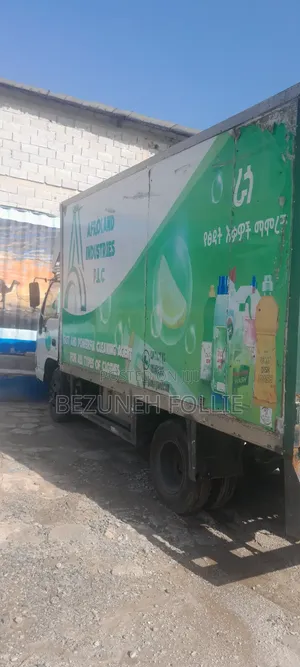 Isuzu NPR With Container
