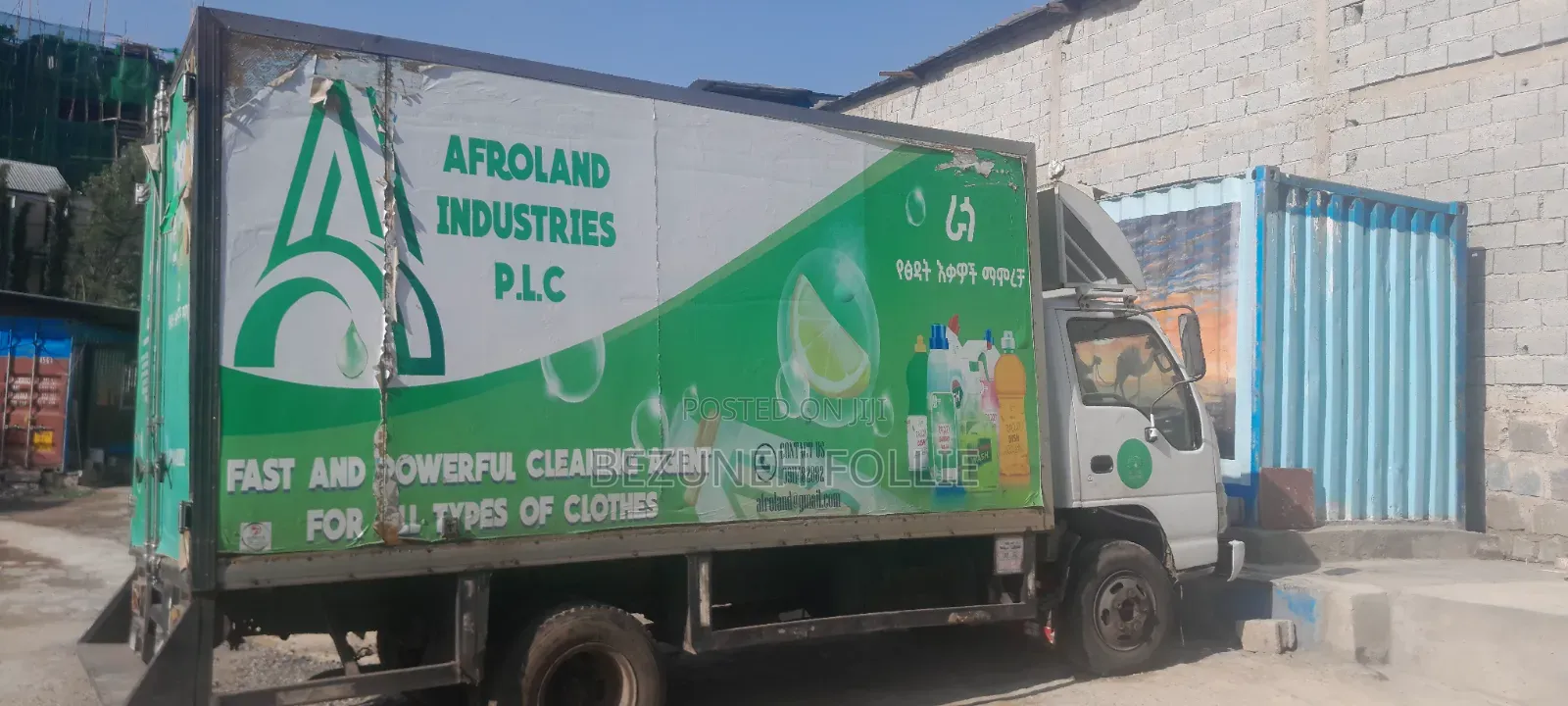 Isuzu NPR With Container