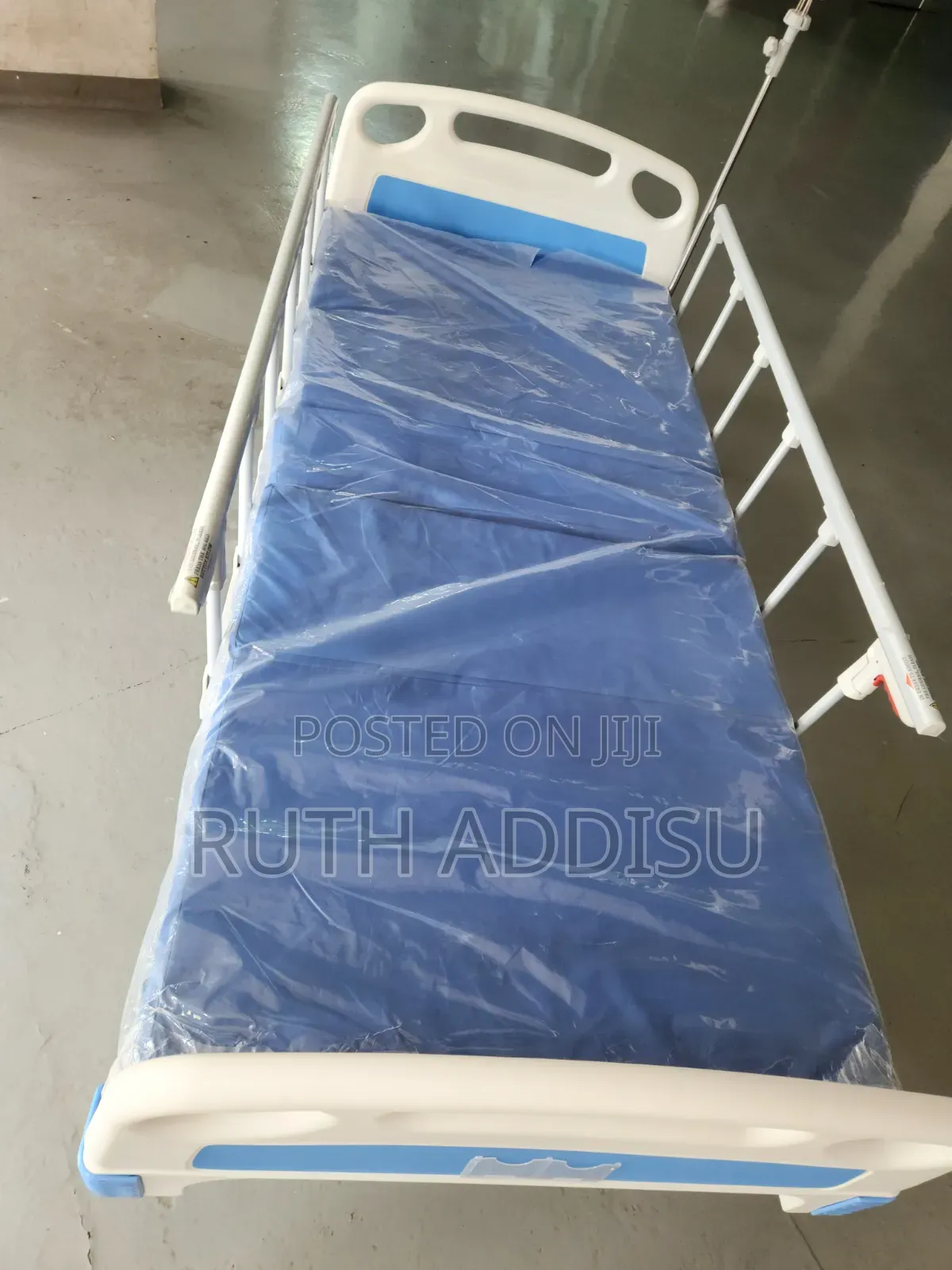 Manual 2-Function Hospital Bed With a White Steel Frame, Blue Abs