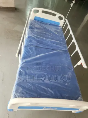 Manual 2-Function Hospital Bed With a White Steel Frame, Blue Abs