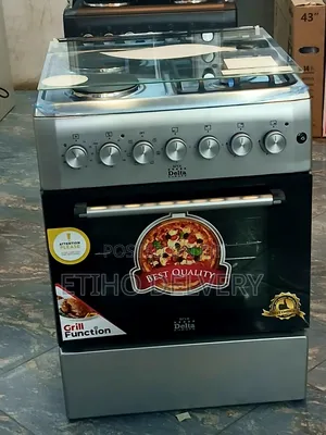 Delta Esteles Ovn 60/60this Label Features a Graphic of a Pizza With