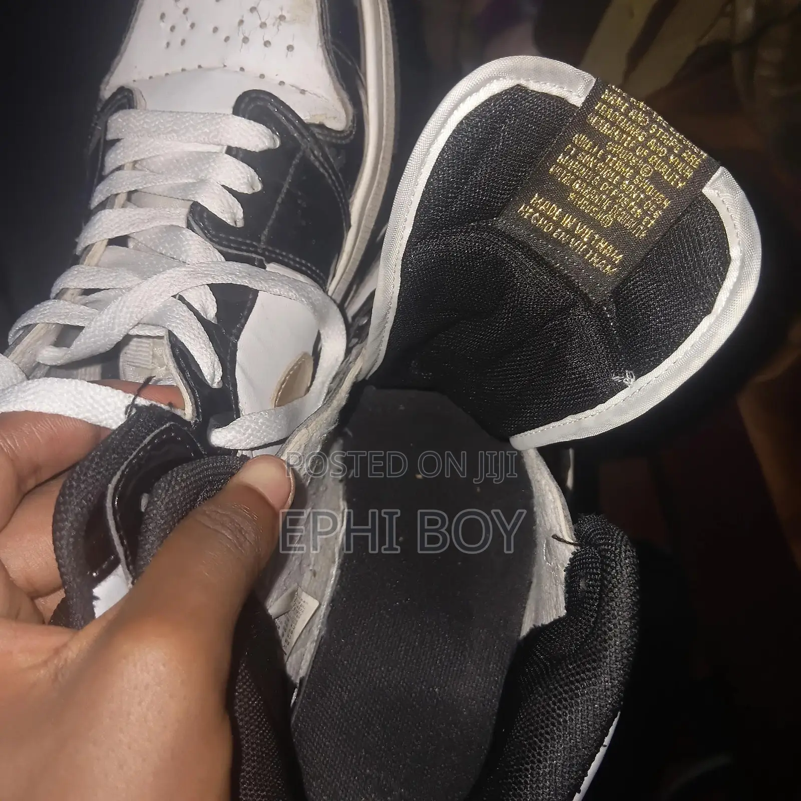 Nike Air Jordan 1 Mid in a Black/White/Metallic Gold