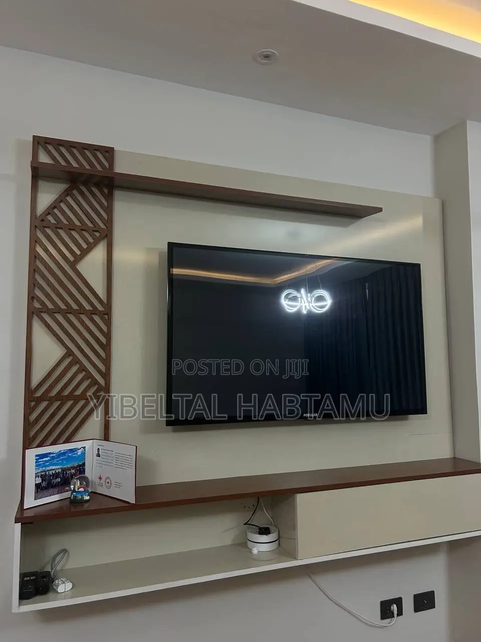 Washing Machine,Sofa and 55 Inch Tv With Background