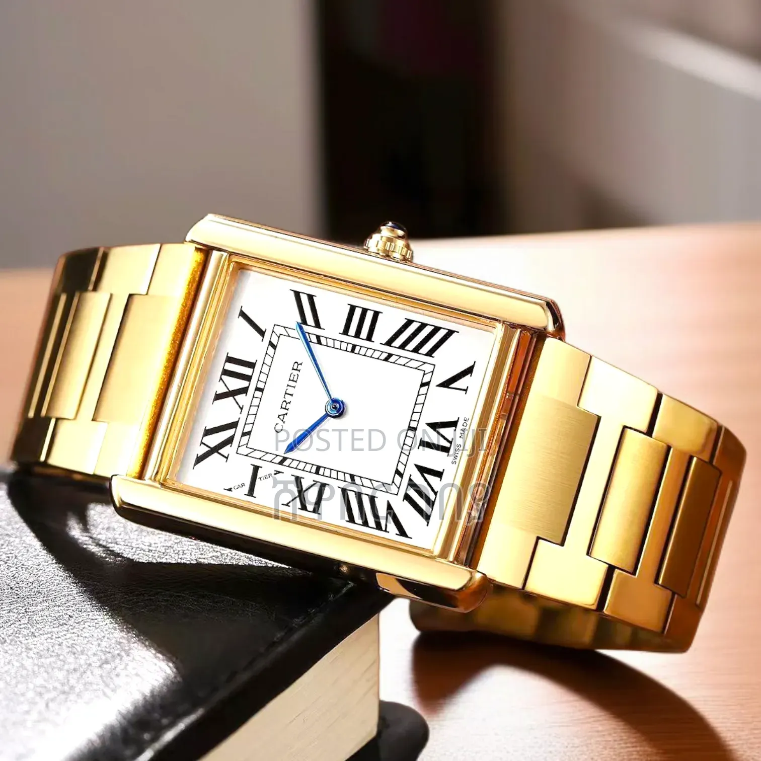 Tank Américaine Watch — Gold Case, White Dial, Roman Numerals