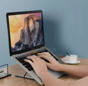 Brand New Foldable Laptop Stand – Adjustable Wireless Desk Riser