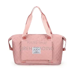 Pink Quilted Travel Bag – Fashion Practica ሮዝ ሐመልማል (የተሰፋ) የጉዞ ቦርሳ