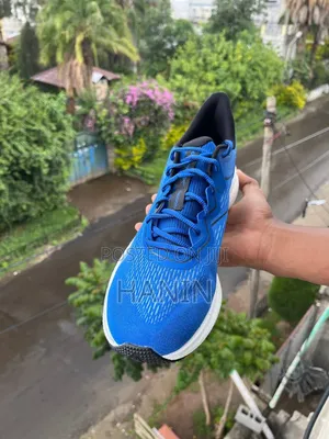 Blue Reebok Running Shoes