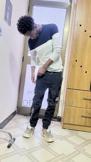 Kenneth Cole "Tech Jogger" Cargo Pants Featuring a Prominent