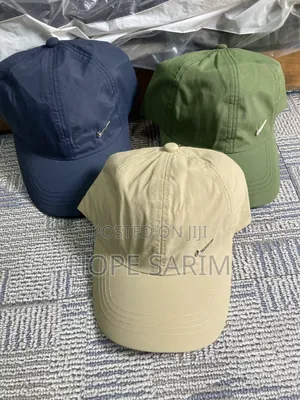 Nike Mini Metallic Swoosh Caps:
