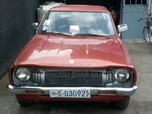 Nissan 100 1975 Burgundy