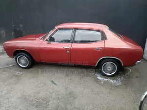 Nissan 100 1975 Burgundy