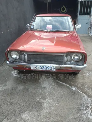Nissan 100 1975 Burgundy