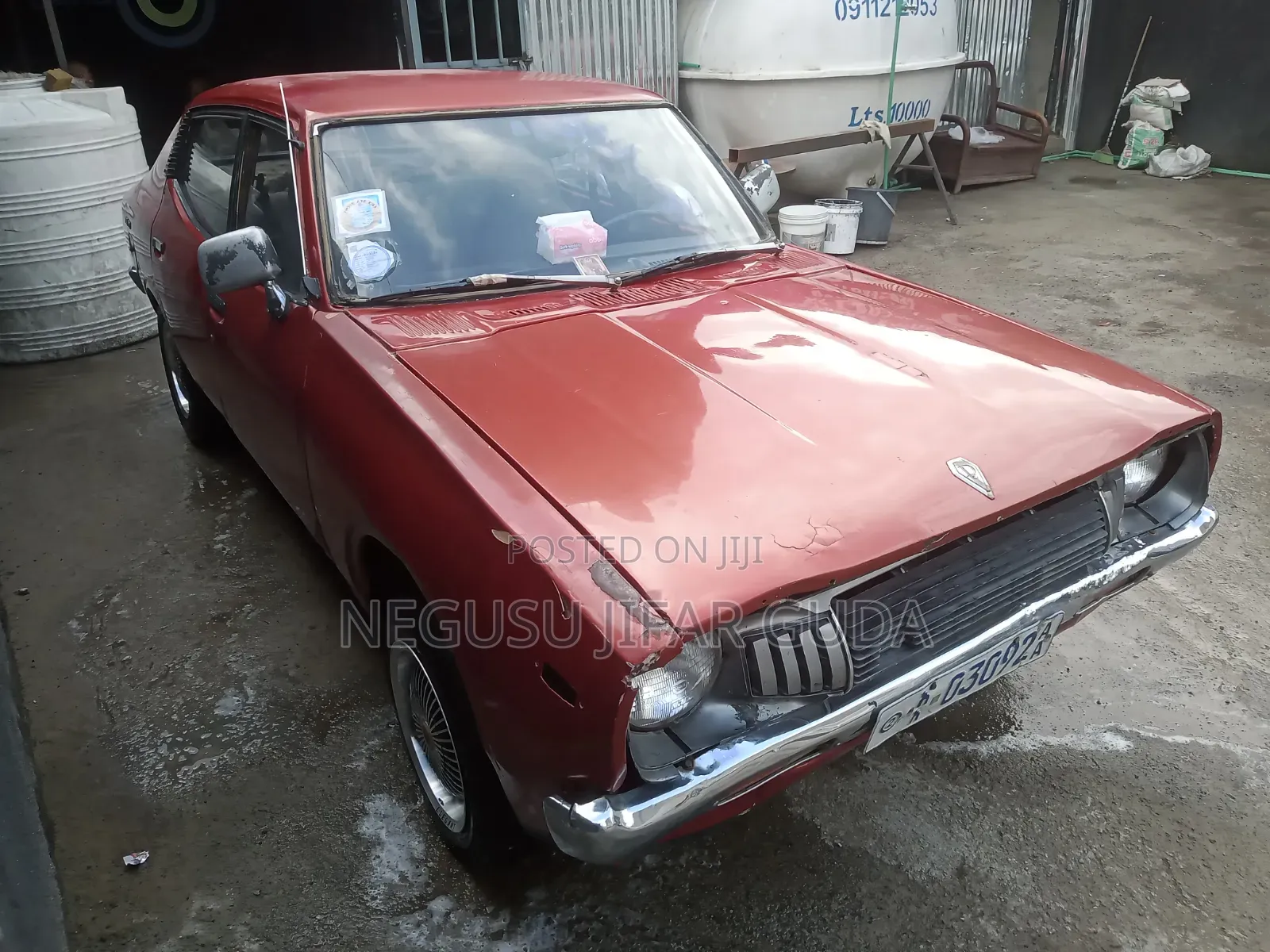 Nissan 100 1975 Burgundy