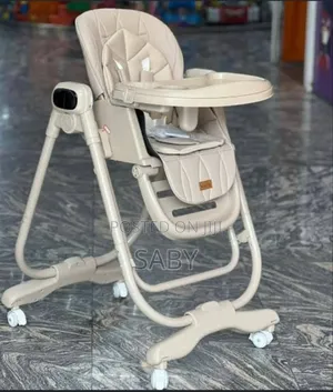 Multifunctional High Chair Features a Beige, Patterned Seat
