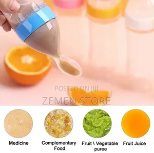 2-in-1 Silicone Squeeze Baby Feeding Bottle With Spoon – Mess-Free