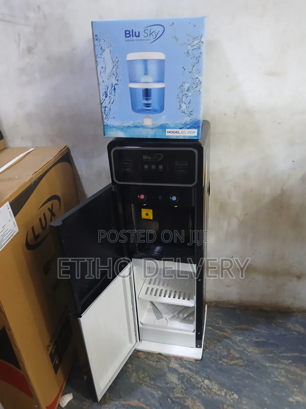 This Blu Sky Water Dispenser (Model Bs-) Features a Sleek Black