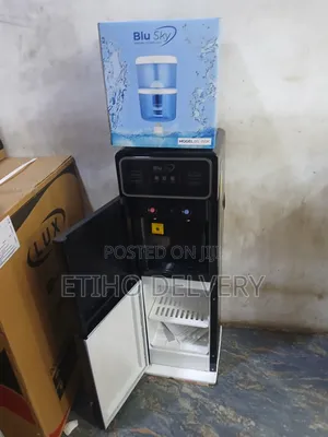 This Blu Sky Water Dispenser (Model Bs-) Features a Sleek Black