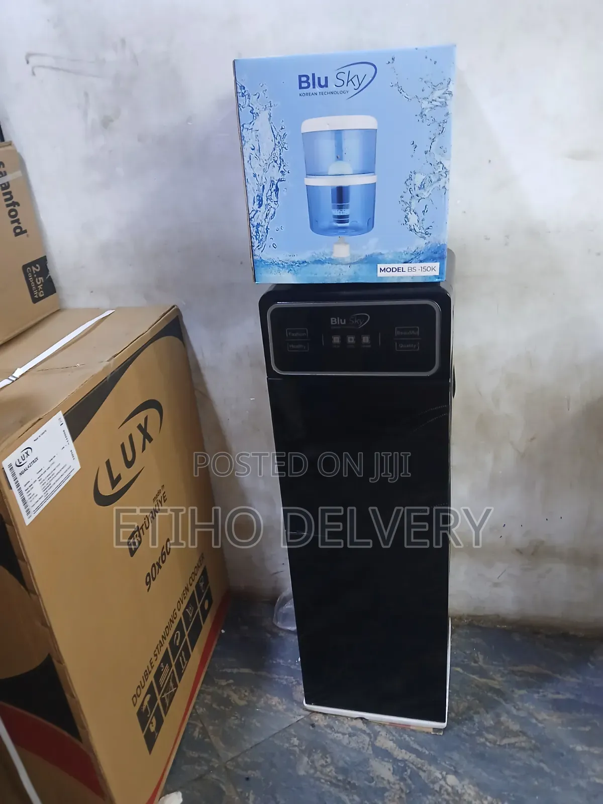 This Blu Sky Water Dispenser (Model Bs-) Features a Sleek Black