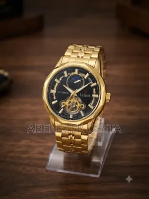 Lexros Automatic Watch Featuring a Dial and a Gold-Tone Stainless