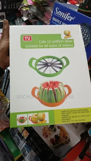 ሀብሃብ፣ ትርንጎ፣ ዱባ፣ ፖፖያና መሰሎችን 12 ቦታ የሚከትፍ Watermelon Slicer/Free Delivery