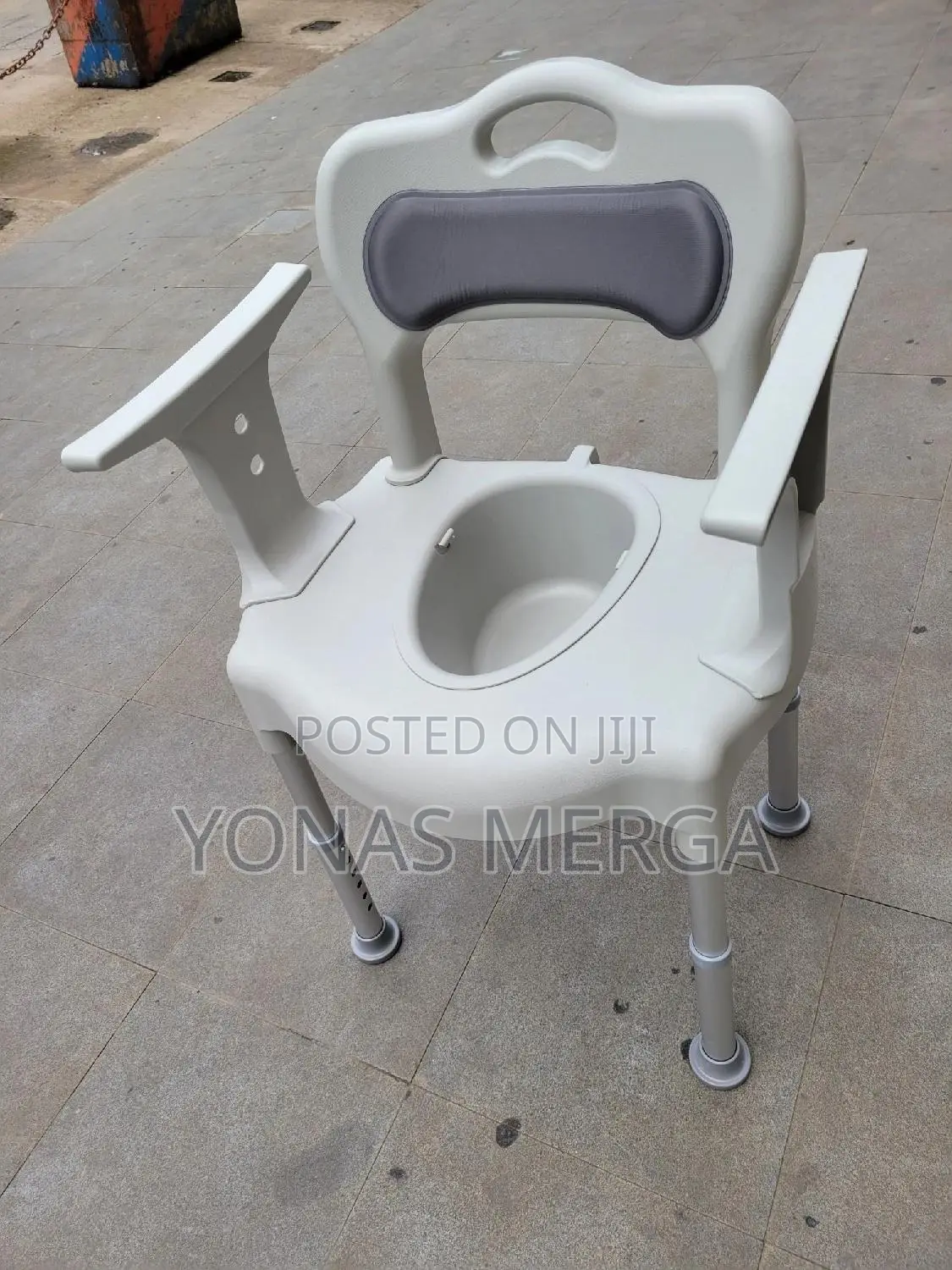 Shower Commode Chair bucket Which Has a Lid With Handle.