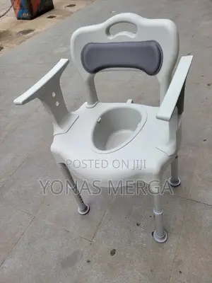 Shower Commode Chair bucket Which Has a Lid With Handle.