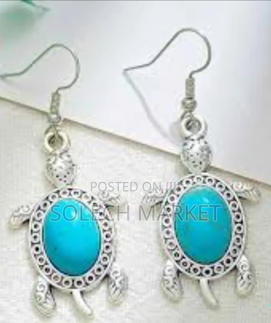 Silfer Tone Earring