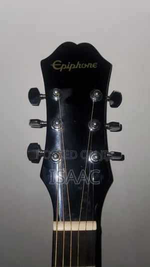 Epiphone Acoustic Guitar With Extra Strings and Guitar Picks