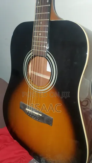 Epiphone Acoustic Guitar With Extra Strings and Guitar Picks