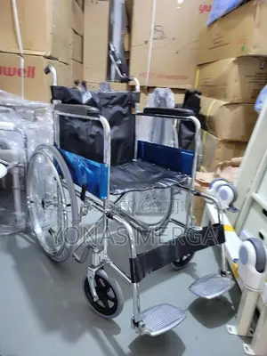 Normal Wheelchair韜台smaller Front Casters for Steering.