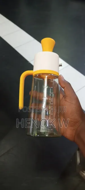 Oil Dispenser ዘይት መቀነሻ