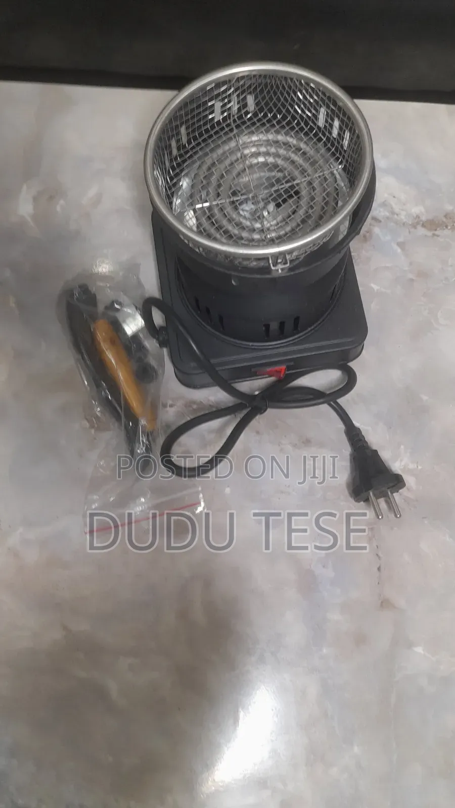 ከሰል ለማቀጣጠል የሚረዳ ማሽን