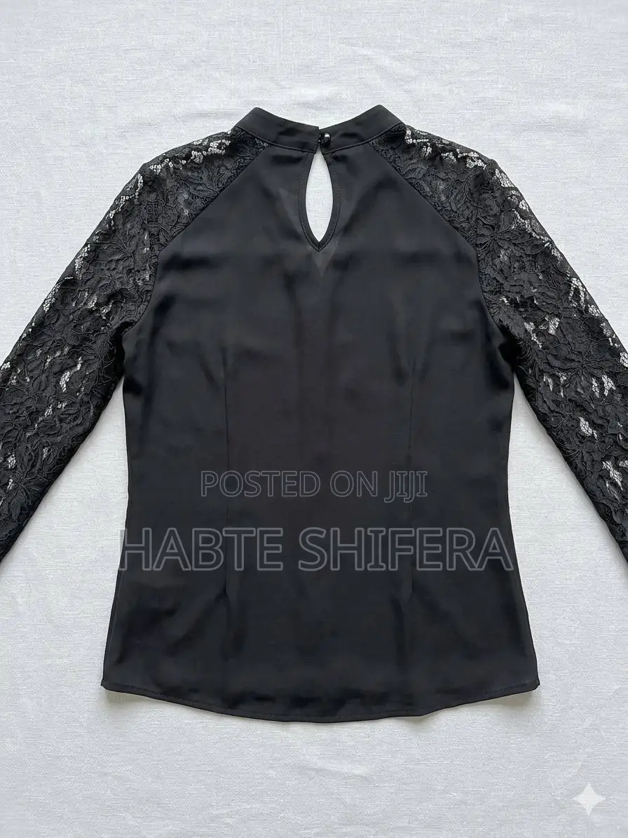 Elegant Black High-Neck Blouse With Lace Sleeves