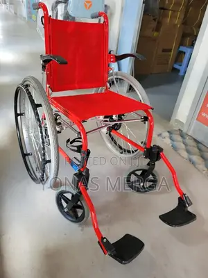 European Model Wheelchair乏令solid PU Rear Wheels and Anti Tip System.