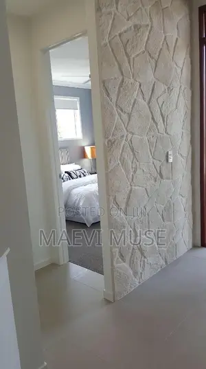 Custom Stone Walls Interior Renovations (High-End, Service-Focused)