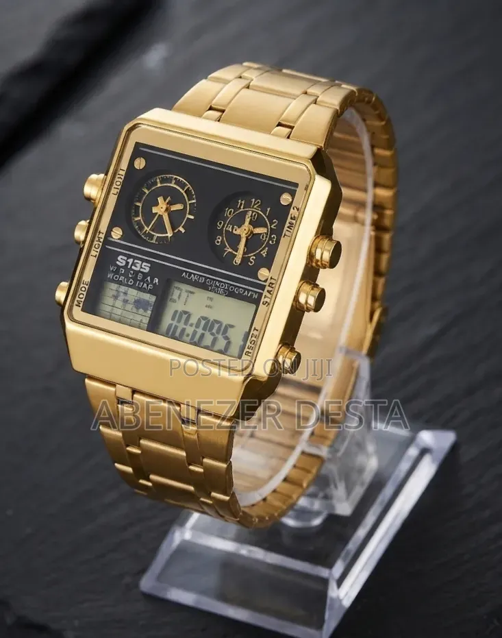 Watch Featuring a Prominent Gold-Toned Stainless Steel Band and Case.