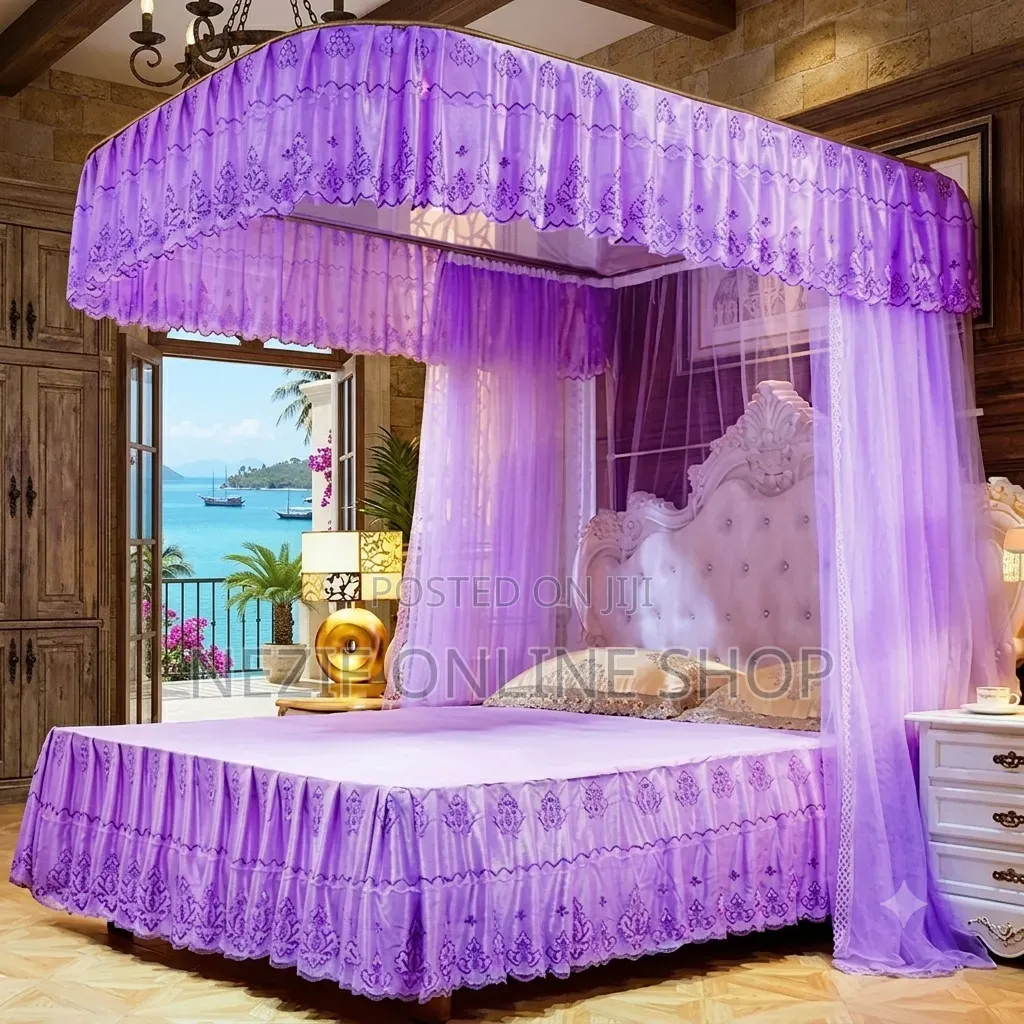 Luxurious Canopy Bed Setup With a Purple Mosquito Net Ensemble: