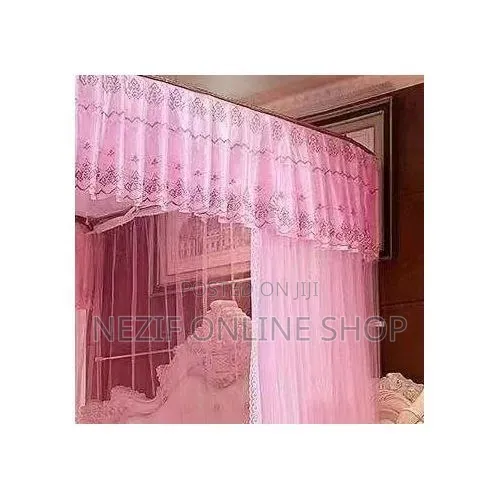 Luxurious Canopy Bed Setup With a Purple Mosquito Net Ensemble: