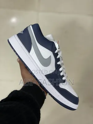 Nike Air Jordan 1 Low Sneakers in a White, Midnight Navy,