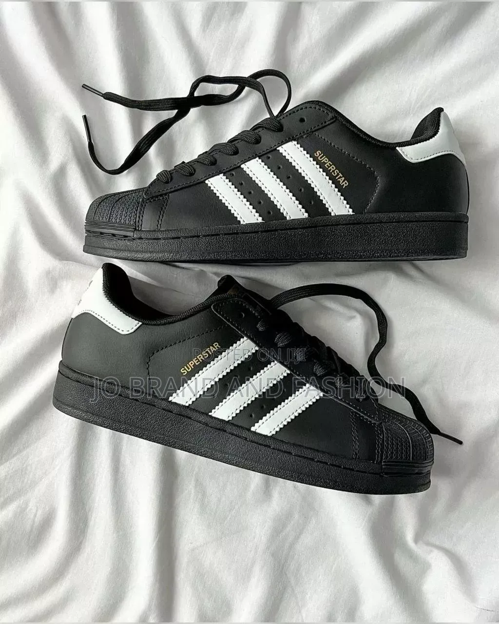 Black and White Adidas Superstars