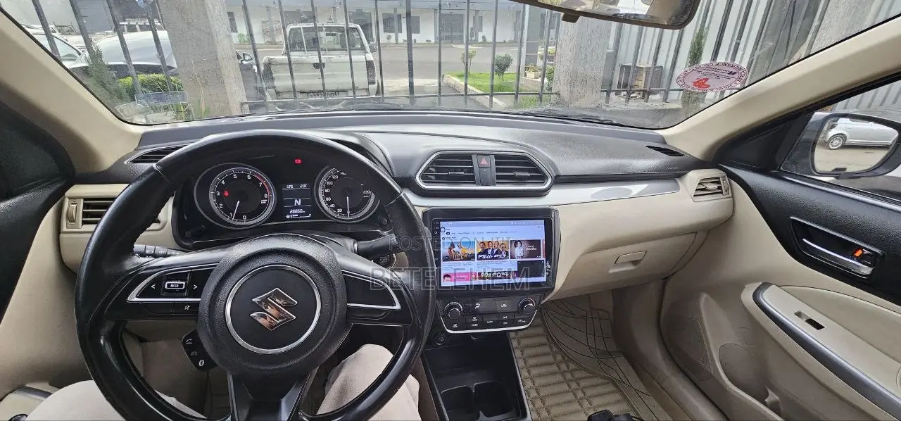 Suzuki Dzire 2024 Brown
