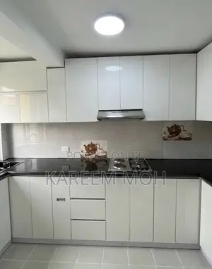 Uv Door Kitchen Cabinet/ በዪቪ በር የተሰራ ኪችን ካቢኔት