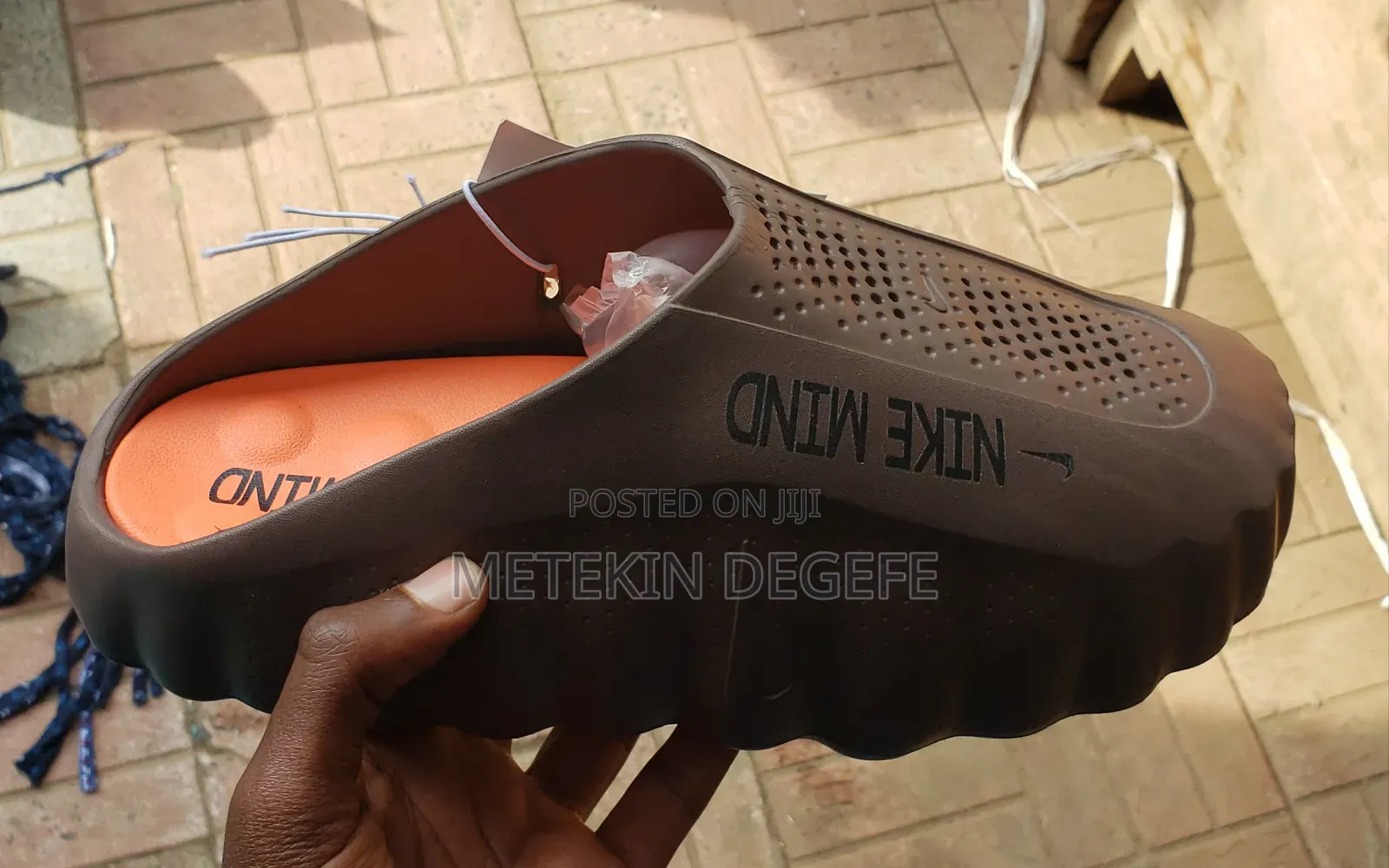 Nike Mind 001 Slip-on Mules in a White and Orange Colorway