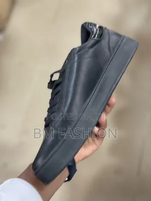 Lacoste Low-Top Sleek in Triple Black Colorway