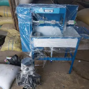 ጫማ ማጠቢያ እና ማድረቂያ ማሽን (Shoe Washing and Drying Machine)