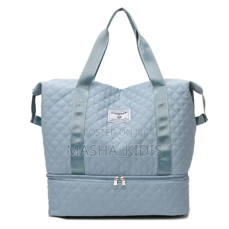 Oversized Travel Duffel Features a White Quilty